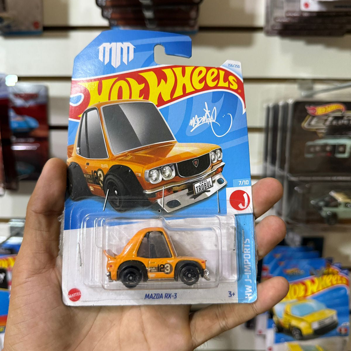 HW Básico Mazda Rx-3 - Tarjeta dañada
